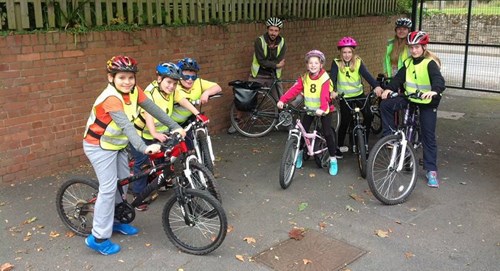 A group of children on bicycles