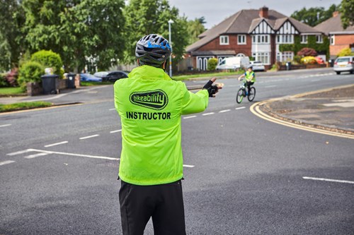 A photo of a Bikeability Instructor taking a class